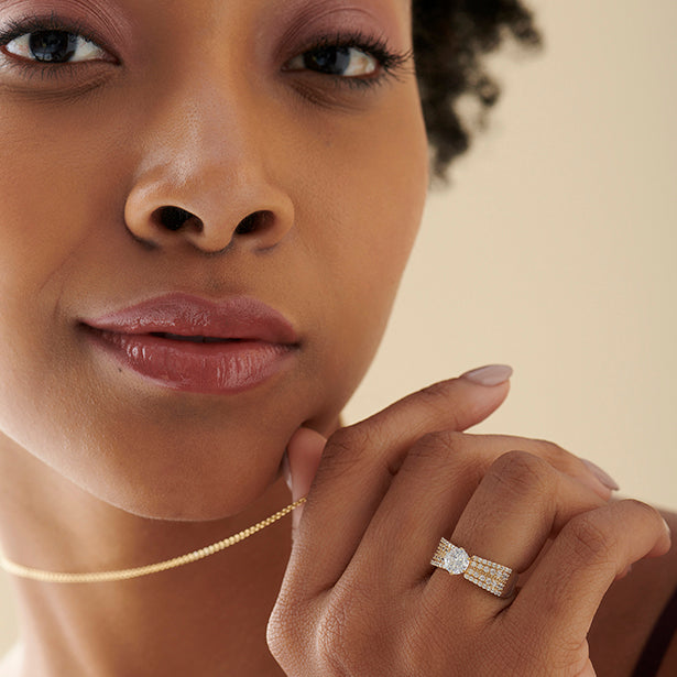 Elegant Round Center Stone Ring with Diamond Shoulders