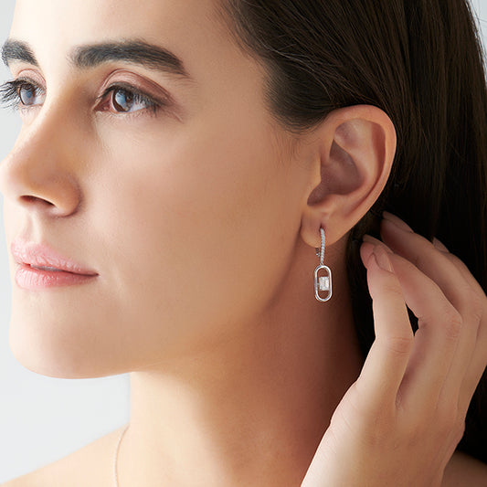 Elegant emerald cut diamond drop earring