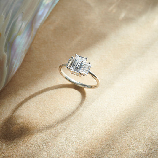 Emerald Cut with Side Baguette Three Stone Engagement Ring