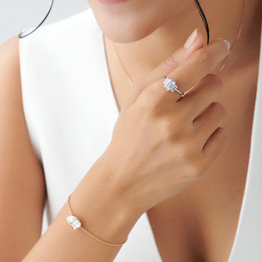 Emerald Cut with Side Baguette Three Stone Engagement Ring