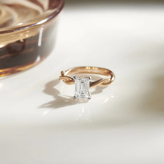 Emerald Cut Twisted Solitaire Engagement Ring