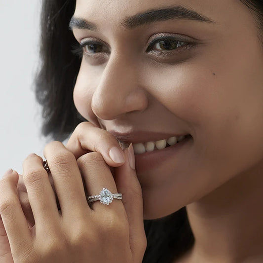 Pear-Shaped Gemstone with Diamond Halo and Accents Ring