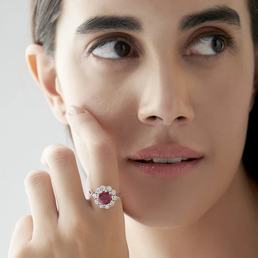 Pear and Round Diamond Halo Ring with Center Gemstone