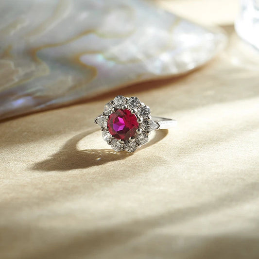 Pear and Round Diamond Halo Ring with Center Gemstone